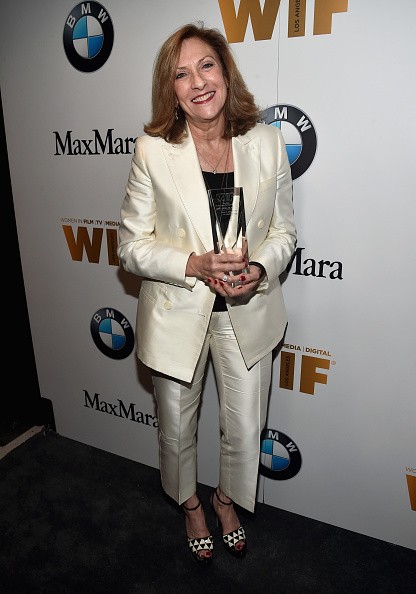 Honoree Lesli Linka Glatter, wearing Max Mara, poses with the BMW Dorothy Arzner Directors Award during the Women In Film 2016 Crystal + Lucy Awards Presented by Max Mara and BMW at The Beverly Hilton on June 15, 2016 in Beverly Hills, California.