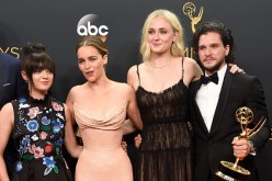 (L-R) Actors Maisie Williams, Emilia Clarke, Sophie Turner and Kit Harington, winners of Best Drama Series for 'Game of Thrones', pose in the press room during the 68th Annual Primetime Emmy Awards.