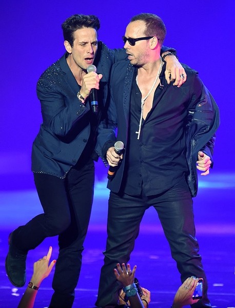 Joey McIntyre and Donnie Wahlberg of New Kids on the Block perform during the first show of the group's four-night run at The Axis at Planet Hollywood Resort & Casino on July 10, 2014 in Las Vegas, Nevada. 