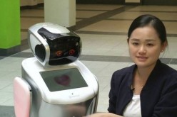 One of China's new robot customs cops (the one on the left).