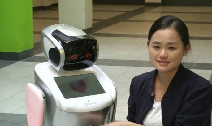 One of China's new robot customs cops (the one on the left).