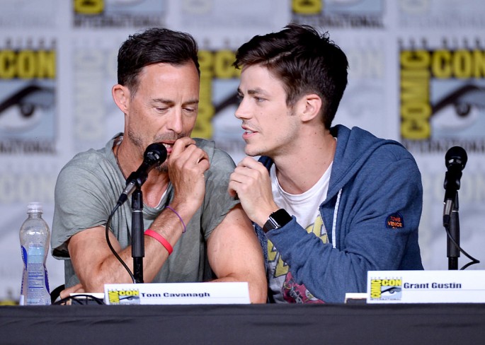 Actors Tom Cavanagh (L) and Grant Gustin attends the 'The Flash' Special Video Presentation and Q&A during Comic-Con International 2016 at San Diego Convention Center on July 23, 2016 in San Diego, California.