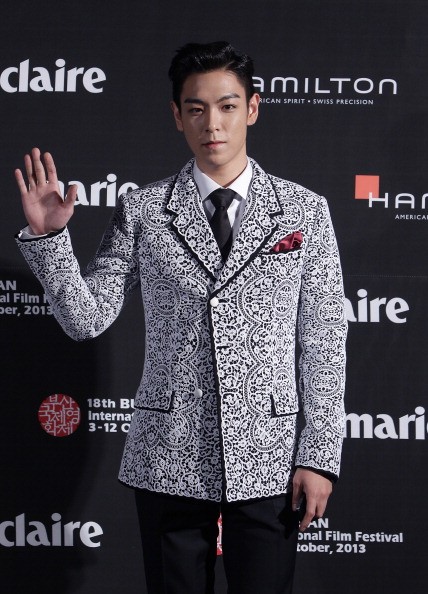 T.O.P of Bigbang arrives for the marie claire Asia Star Awards during the 18th Busan International Film Festival on October 5, 2013 in Busan, South Korea.   