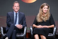 Actors Kiefer Sutherland (L) and Natascha McElhone speak onstage at the 'Designated Survivor' panel discussion during the Disney ABC Television Group portion of the 2016 Television Critics Association Summer Tour at The Beverly Hilton Hotel on August 4, 2
