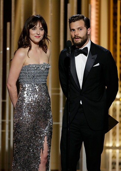 Jamie Dornan and Dakota Johnson rumored to move in together in actor's Hollywood mansion. 