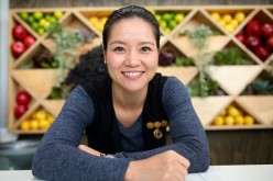 Li Na poses at the Blackmores Wellbeing Oasis during the 2016 Australian Open at Melbourne Park on Jan. 20, 2016, in Melbourne, Australia.