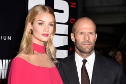 Rosie Huntington-Whiteley (L) and Jason Statham arrives at the Premiere of Summit Entertainment's 'Mechanic: Resurrection' at ArcLight Hollywood on August 22, 2016 in Hollywood, California.   
