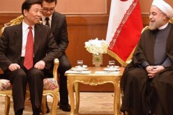 Iranian President Hassan Rouhani meets with Chinese Vice President Li Yuanchao.      