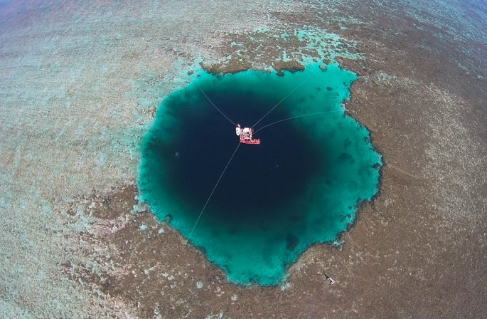 Marine experts explore the Sansha Yongle Blue Hole, also called the "Dragon Hole," on July 24, 2016 in Xisha Islands, Sansha City, Hainan Province.
