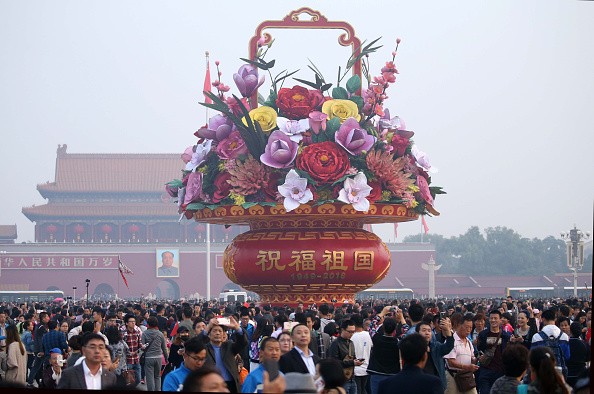 Chinese celebrate the National Day on Oct. 1.