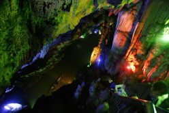 Tourists on a boat take sightseeing in the Longlin Palace Karst Cave on April 25, 2007 in Enshi Tujia and Miao Autonomous Prefecture of Hunan Province, China.