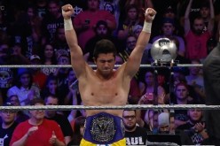 T.J. Perkins celebrates winning the CWC and becoming the new WWE Cruiserweight Champion.