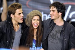 Paul Wesley, Nina Dubrev and Ian Somerhalder pose for a picture at 'The Vampire Diaries' Hot Topic tour at the Westfield Topanga Mall on February 13, 2010 in Canoga Park, California. 