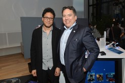 Shawn Layden, president of Sony Interactive Entertainment America, sells the first PlayStation VR system to a lucky fan.