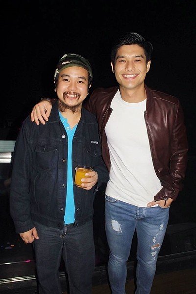 Yibada editor Conan Altatis poses with JC de Vera at the after-party for the 'Best. Partee. Ever.' gala screening. The film is written by Honee Alipio and directed by HF Yambao.