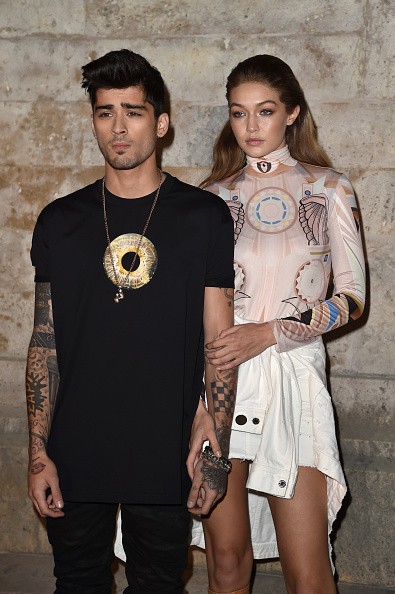 Zayn Malik and Gigi Hadid attend the Givenchy show as part of the Paris Fashion Week Womenswear Spring/Summer 2017 on October 2, 2016 in Paris, France.