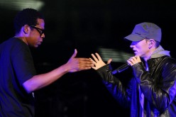 Rappers Jay-Z and Eminem perform together on-stage at the launch of 'DJ Hero' at the Wiltern Theatre on June 1, 2009 in Los Angeles, California. 