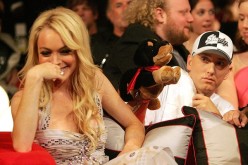Lindsay Lohan reacts to the insult dog performed by Eminem during the 2005 MTV Movie Awards at the Shrine Auditorium June 4, 2005 in Los Angeles, California. 