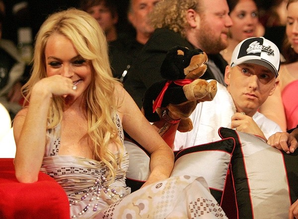 Lindsay Lohan reacts to the insult dog performed by Eminem during the 2005 MTV Movie Awards at the Shrine Auditorium June 4, 2005 in Los Angeles, California. 
