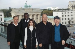 Dan Brown, Omar Sy, Felicity Jones, Tom Hanks and Ron Howard attend the photocall for 'Inferno' near the Brandenburg Gate at Akademie der Kuenste on October 10, 2016 in Berlin, Germany. 