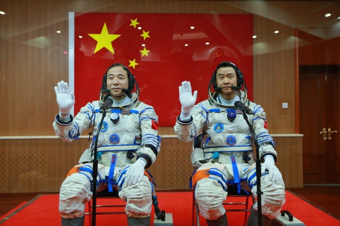 Chinese astronauts Jing Haipeng and Chen Dong during the send-off ceremonies for their mission aboard the Tiangong 2 space station.