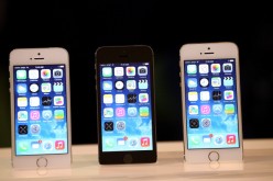 The new iPhone 5S is displayed during an Apple product announcement at the Apple campus on September 10, 2013 in Cupertino, California.