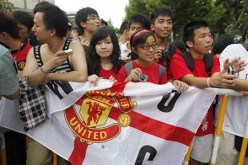 Chinese soccer fans regularly follow matches in the English Premier League.