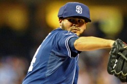 alex-torres-pitches-with-mlb-approved-protective-cap.jpg