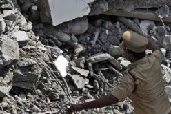 a-dead-body-trapped-under-the-rubble-of-a-chennai-building.jpg