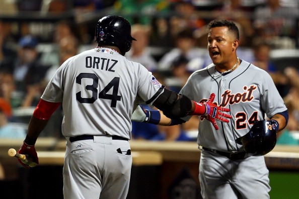 David Ortiz greets Miguel Cabrera after Cabrera scored in the fourth inning during the 84th MLB All-Star Game.