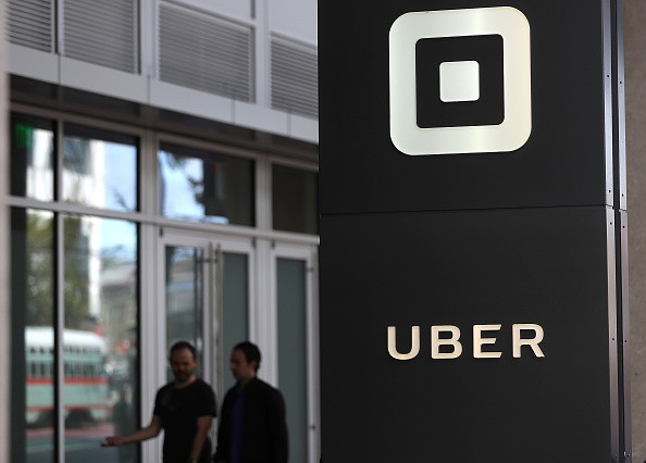 The logo of the ride-sharing service Uber is seen in front of its headquarters on Aug. 26, 2016, in San Francisco, California.