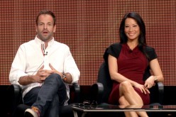 Actors Jonny Lee Miller (L) and Lucy Liu speak at the 'Elementary' discussion panel during the CBS portion of the 2012 Summer Television Critics Association tour at the Beverly Hilton Hotel on July 29, 2012 in Los Angeles, California.   