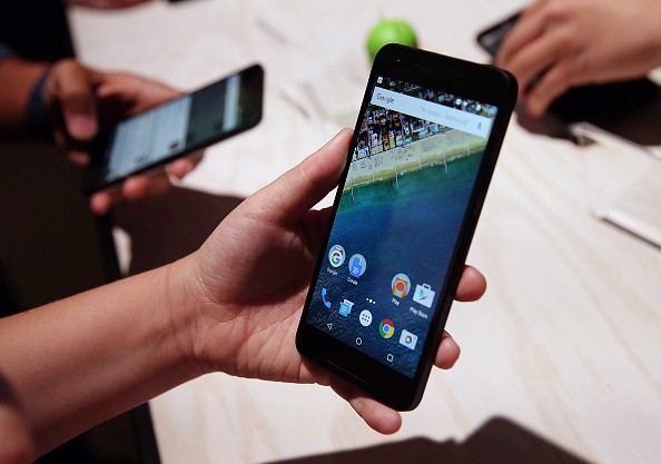 An attendee inspects the new Nexus 5X phone during a Google media event on September 29, 2015 in San Francisco, California.