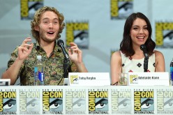  Actor Toby Regbo (L) and actress Adelaide Kane attend The CW's 'Reign' exclusive premiere screening and panel during Comic-Con International 2014.