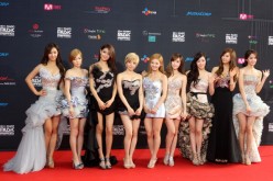 Girls' Generation attended the 2011 Mnet Asian Music Awards at the Singapore Indoor Stadium. 