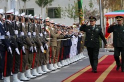 Chinese Defense Minister Gen. Chang Wanquan and Iranian Defense Minister Hossein Dakhan inspect a guard of honor in Tehran.