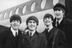 The Beatles, left to right, Paul McCartney, George Harrison, Ringo Starr and John Lennon (1940 - 1980) arrive at London Airport Feb. 6, 1964, after a trip to Paris.