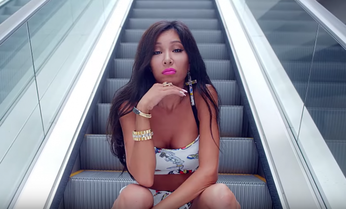 South Korean–American rapper Jessi is a former member of the hip-hop trio Lucky J under YMC Entertainment. 