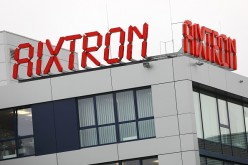 Aixtron's signage is displayed on top of its headquarters in Herzogenrath, western Germany.