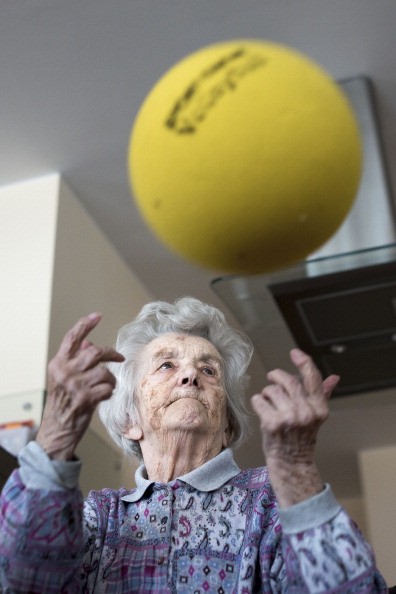 Day guest Helga, who has dementia, during a sport lesson in the geriatric day care facility of the German Red Cross (DRK, or Deutsches Rotes Kreuz) at Villa Albrecht on March 18, 2013 in Berlin, Germany.