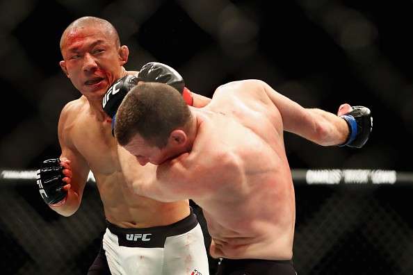 Kyoji Horiguchi believes UFC flyweight champ Demetrious Johnson will defend his title over his "The Ultimate Fighter 24" opponent.