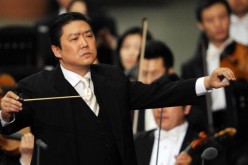 Chief Conductor Long Yu leads the CPO and other Chinese classical music ensembles on tour.