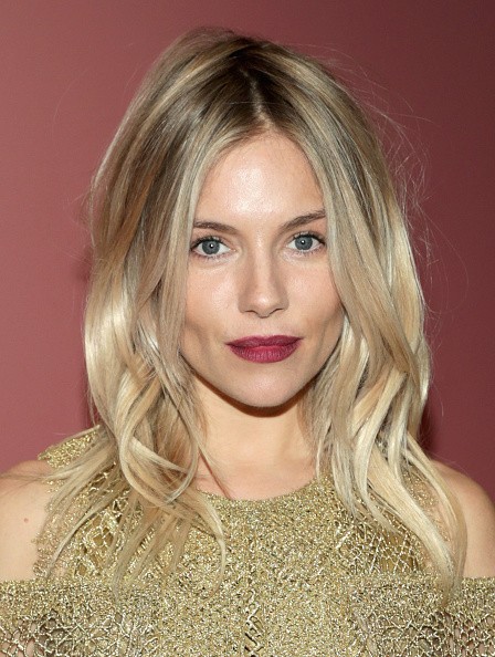Actress Sienna Miller attends the celebration of "The Tale of Thomas Burberry" with Sienna Miller and Dominic West at Burberry Soho on November 14, 2016 in New York City.  