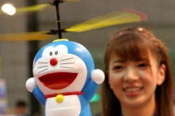 A radio controlled Japanese cartoon character 'Doraemon' flies during the Tokyo Toy Show 2005 hosted by Japan Toy Association on July 21, 2005 in Tokyo, Japan. 