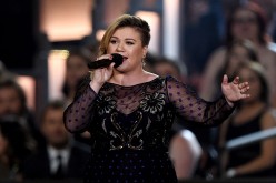 Singer/songwriter Kelly Clarkson speaks during the 50th Academy of Country Music Awards at AT&T Stadium on April 19, 2015 in Arlington, Texas.