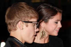 Recording artist Justin Bieber (L) and singer/actress Selena Gomez attend the premiere of Lionsgate Films' 'Abduction' at Grauman's Chinese Theatre on September 15, 2011 in Hollywood, California.