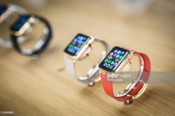 Apple Watch in various colorful straps.