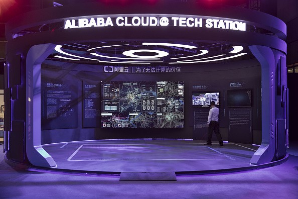 A visitor looks at Alibaba Cloud's display booth during the Singles' Day event.