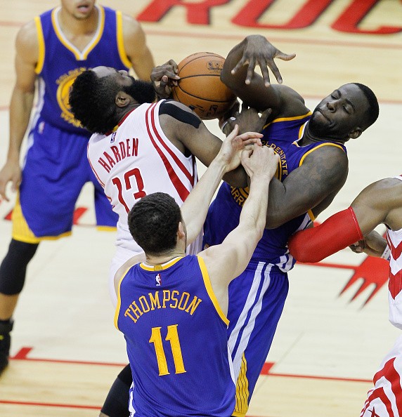 Draymond Green accidentally kicks James Harden in the head in the Golden State Warriors' 127-135 loss to the Houston Rockets Thursday night.