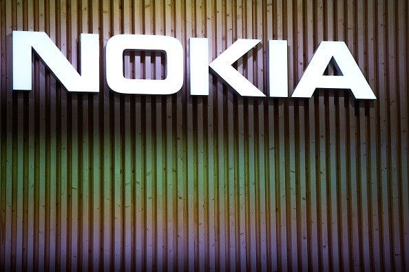 A logo sits illuminated outside the Nokia pavilion during the second day of the Mobile World Congress 2015 at the Fira Gran Via complex on March 3, 2015 in Barcelona, Spain. 